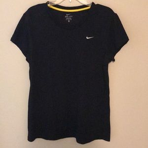 NIKE DRI FIT short sleeve top.